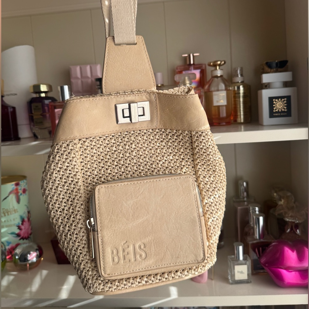 BEIS Tan and Cream Backpack with Woven Texture. THE NATURALS SLING IN BEIGE